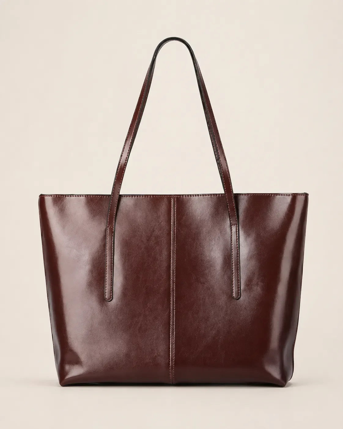 Front profile of the Margaux large dark chocolate leather tote bag crafted from genuine leather with a spacious structured design