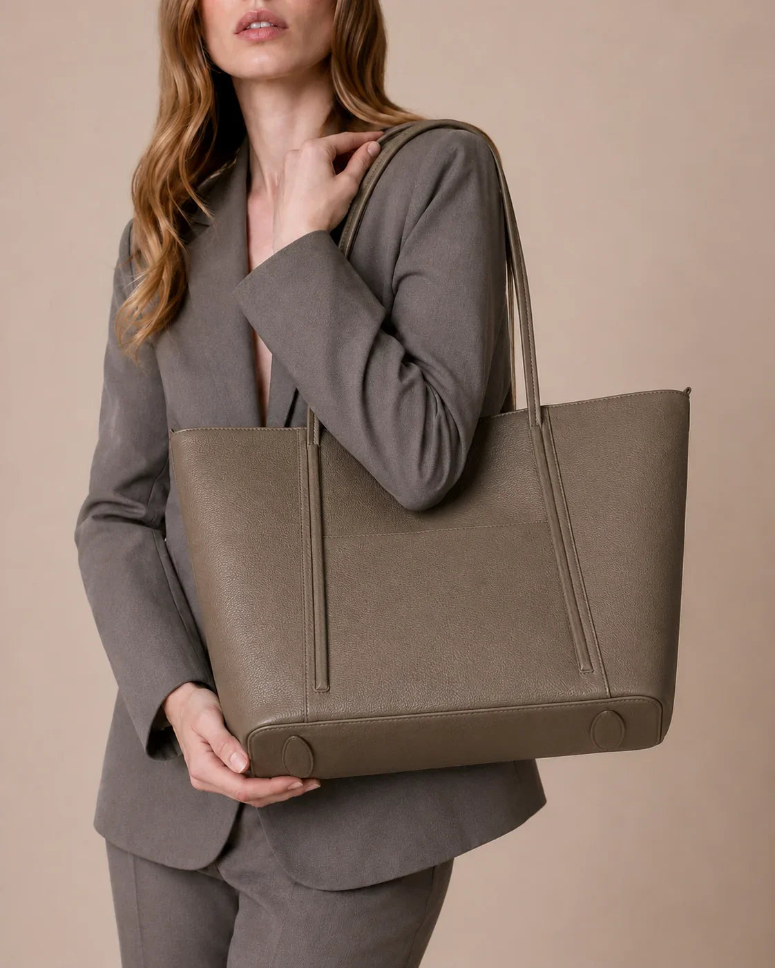 Close-up of The Vivienne genuine leather work tote bag, showcasing its spacious silhouette, premium Togo leather, refined craftsmanship and elegant everyday design for modern women.
