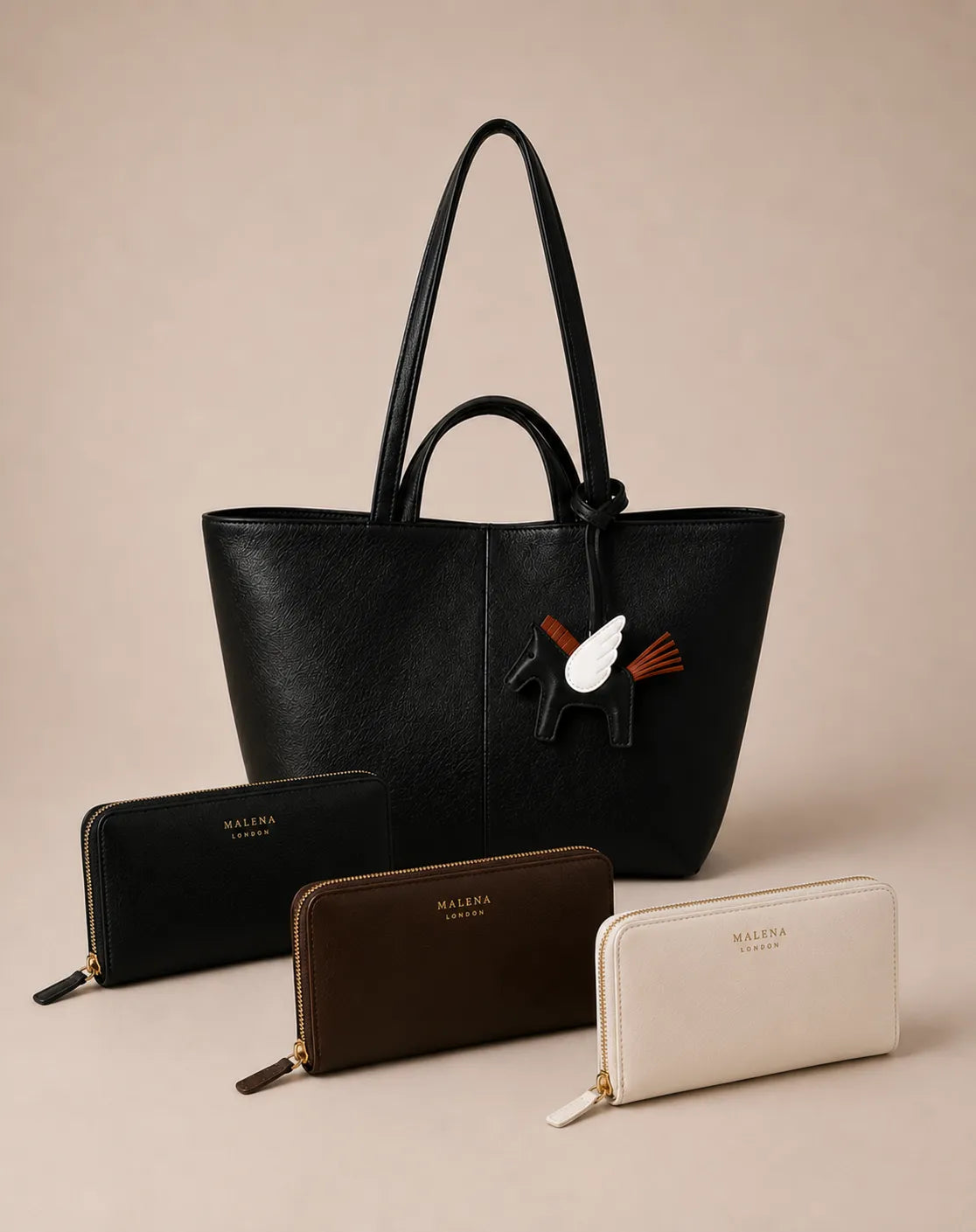 Signature Accessories collection featuring genuine leather wallets and leather bag charms. Premium leather accessories designed to complement modern handbags and everyday essentials.