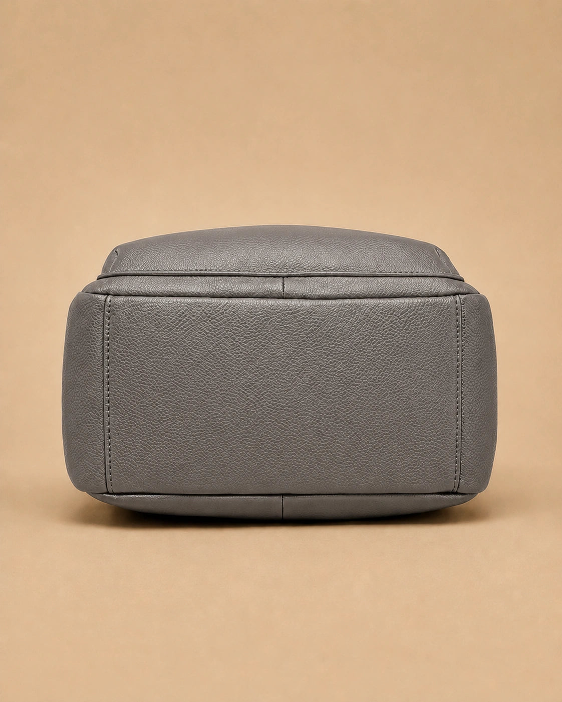 Sloane genuine leather backpack styled for everyday carrying.