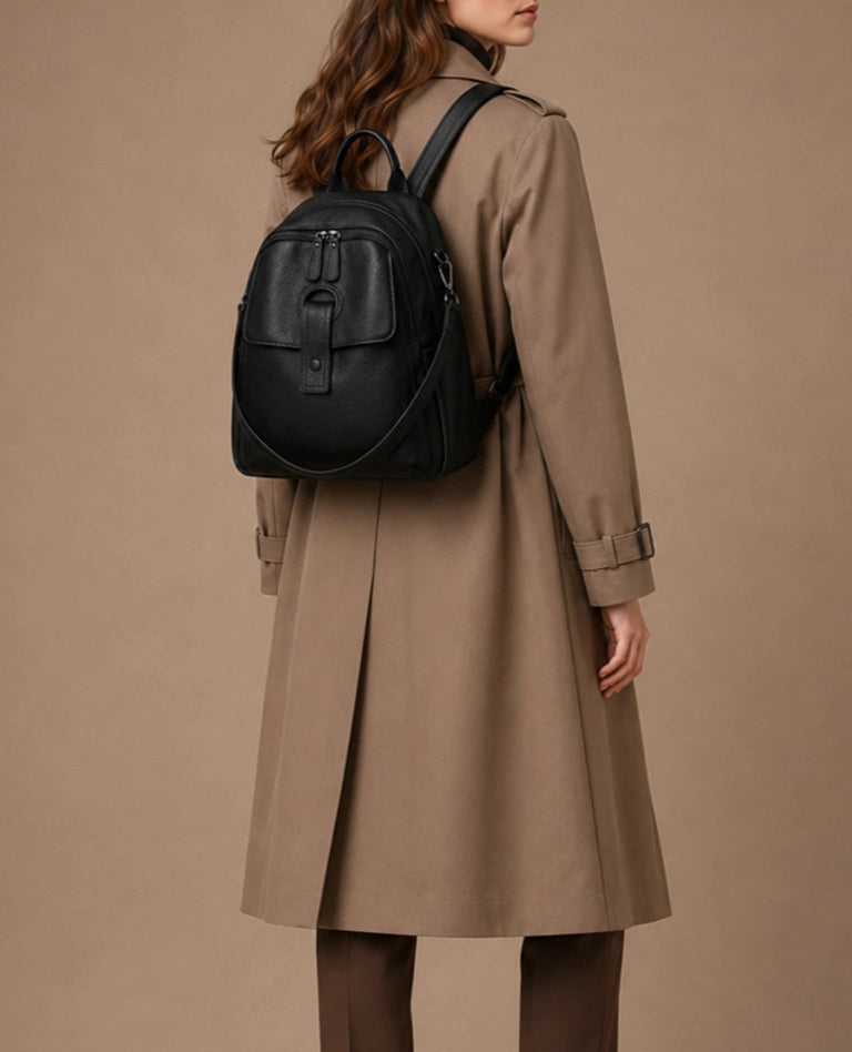 Sloane leather backpack worn on the back with adjustable backpack straps.