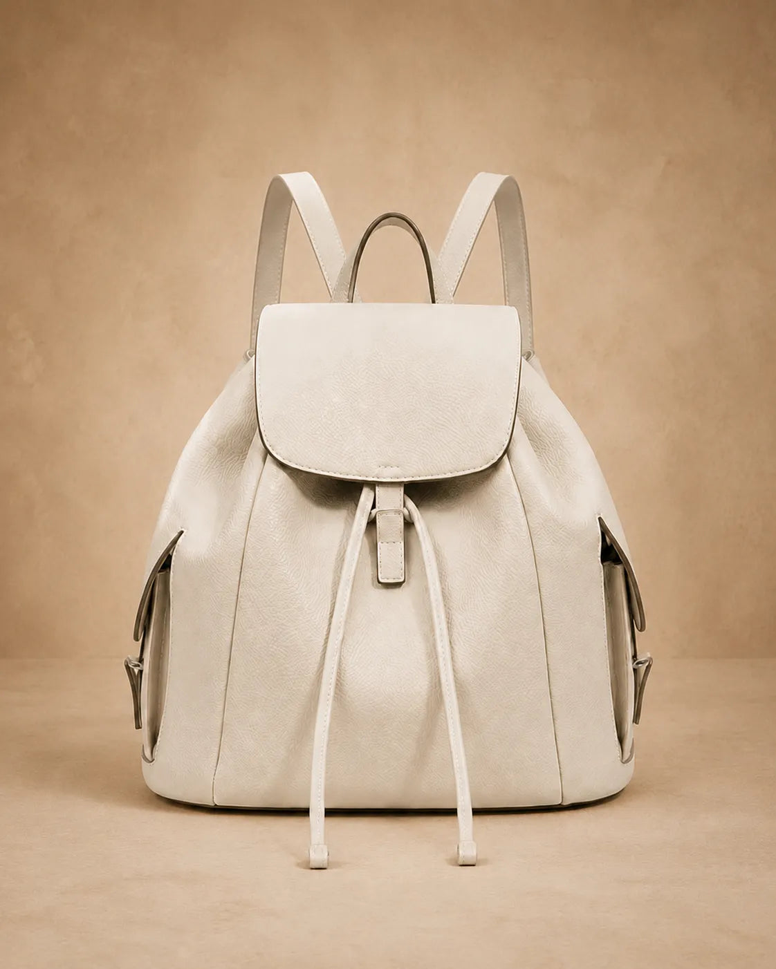 Genevieve leather backpack shown from the back with straps adjusted.