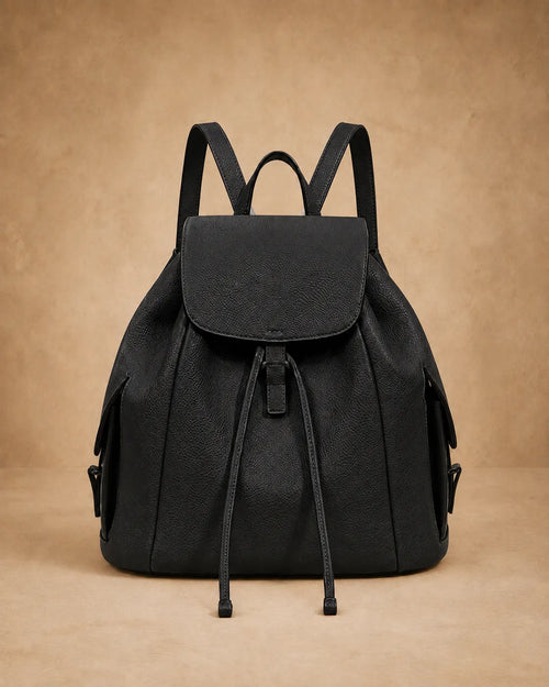 Front view of the Genevieve large genuine leather backpack showing the spacious silhouette.