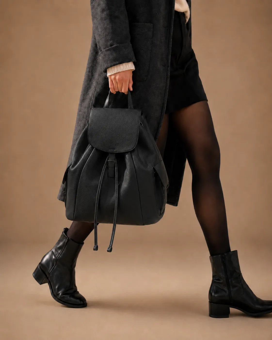 Interior view of the Genevieve leather backpack showing the roomy main compartment.