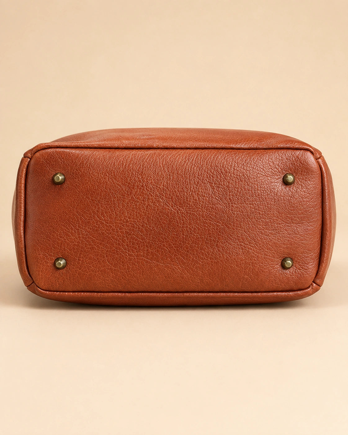 Detail view of the Adeline leather backpack's vintage colour variation.