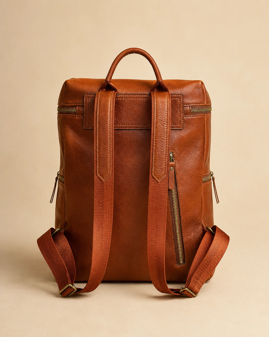 Adeline leather backpack shown with the main compartment open.