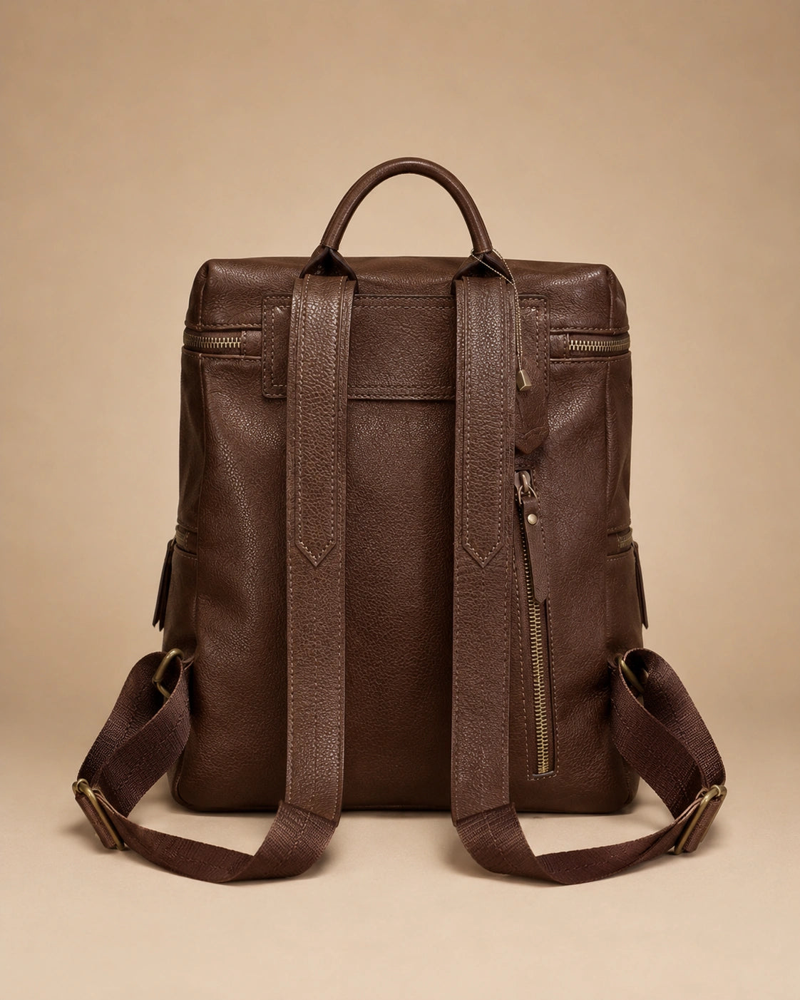 Adeline leather backpack shown from the back with straps adjusted.