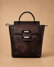 Odette leather backpack shown with the ID holder and sandwich zip pocket.