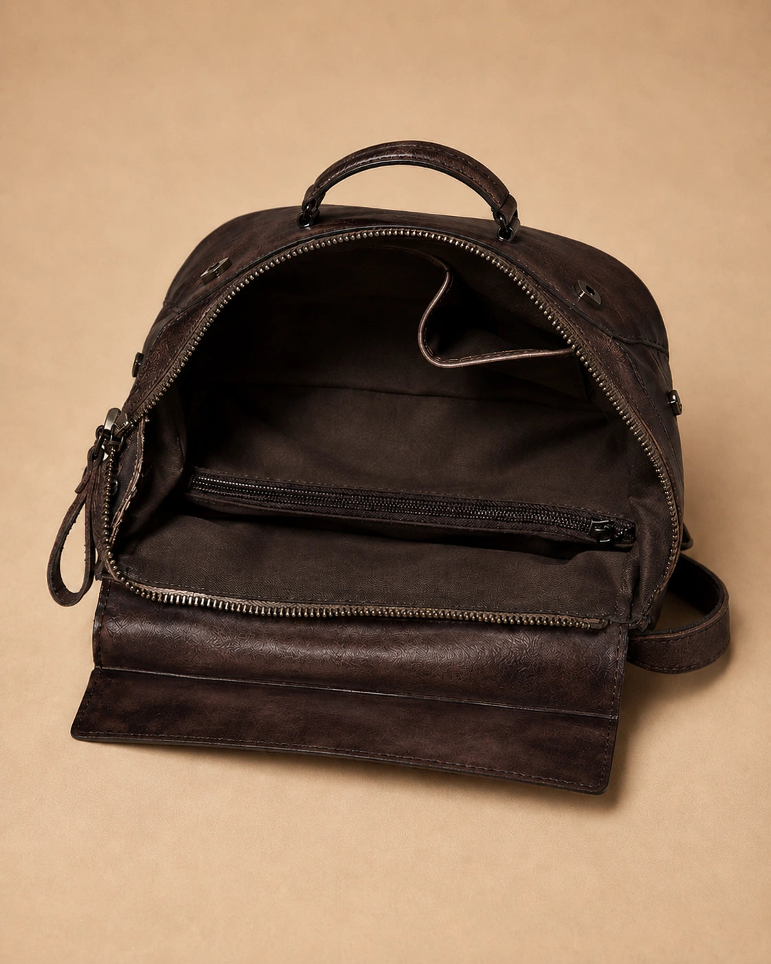 Odette leather backpack shown from the back with straps adjusted.