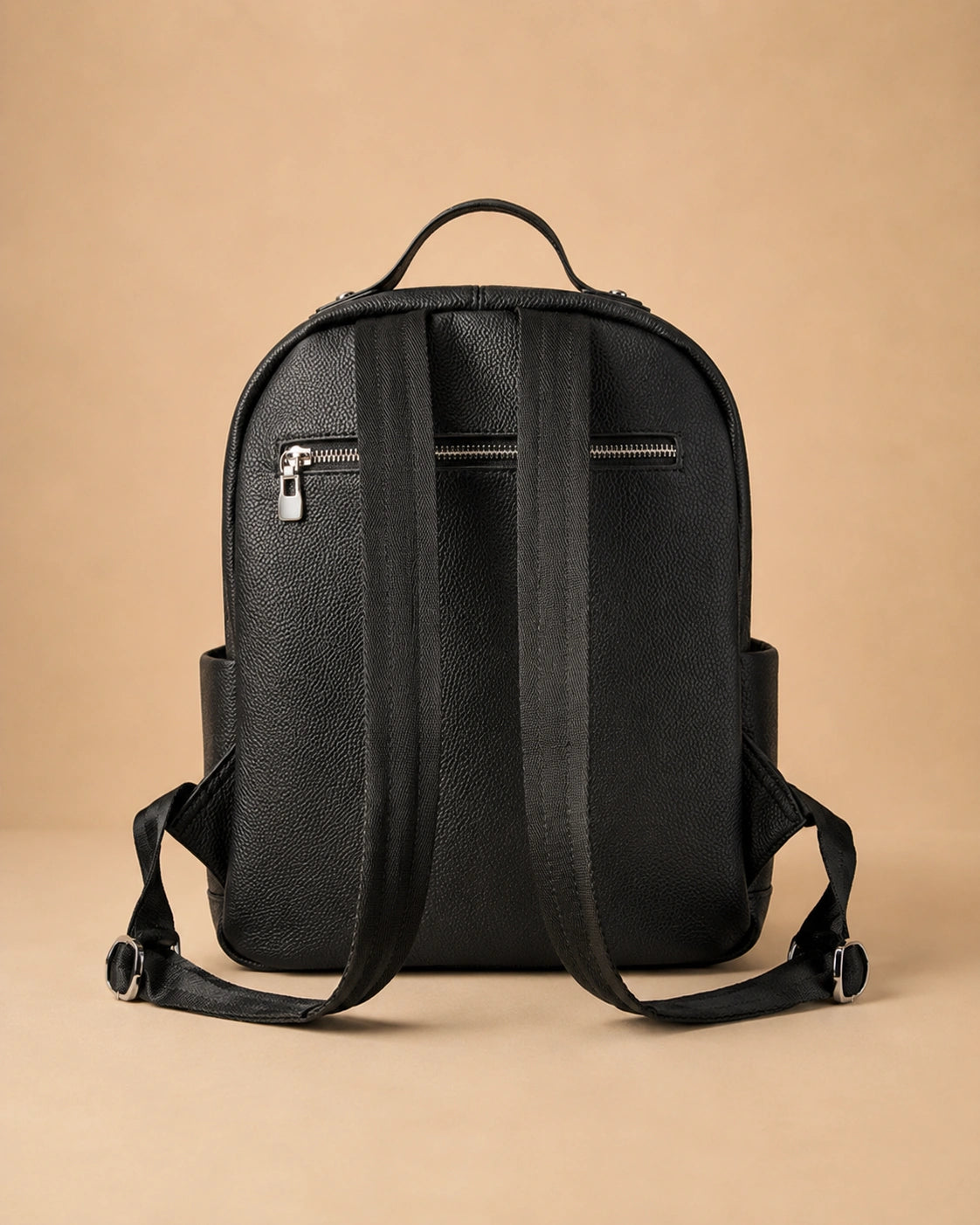 Josephine leather backpack styled for daily commuting.