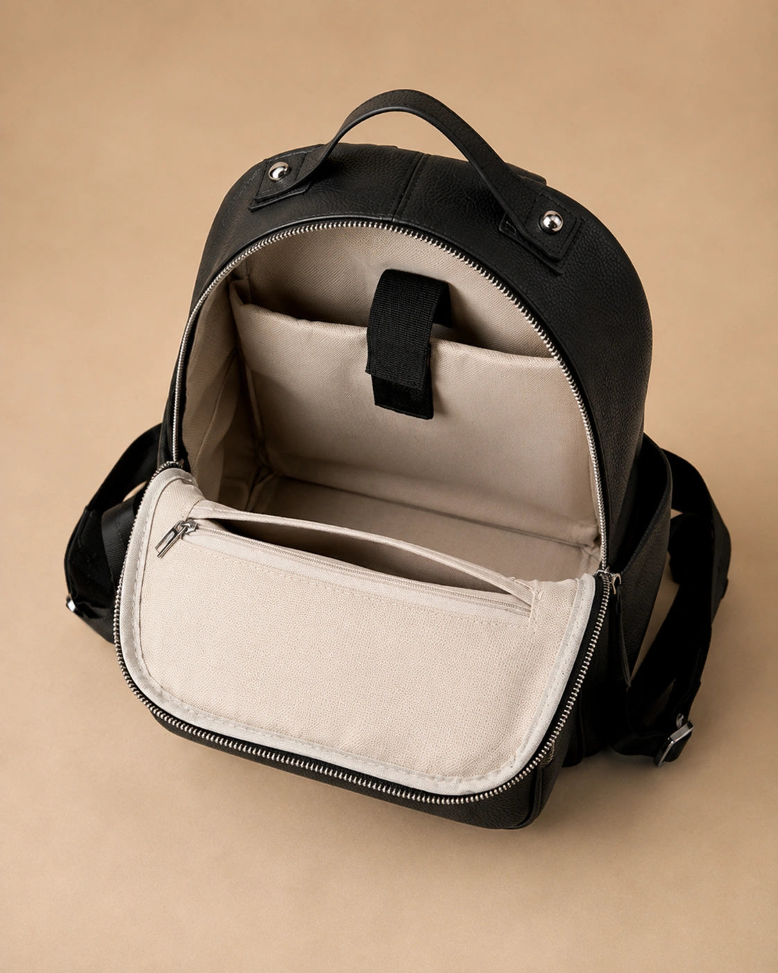Close-up of the Josephine leather backpack's stitching and leather texture.