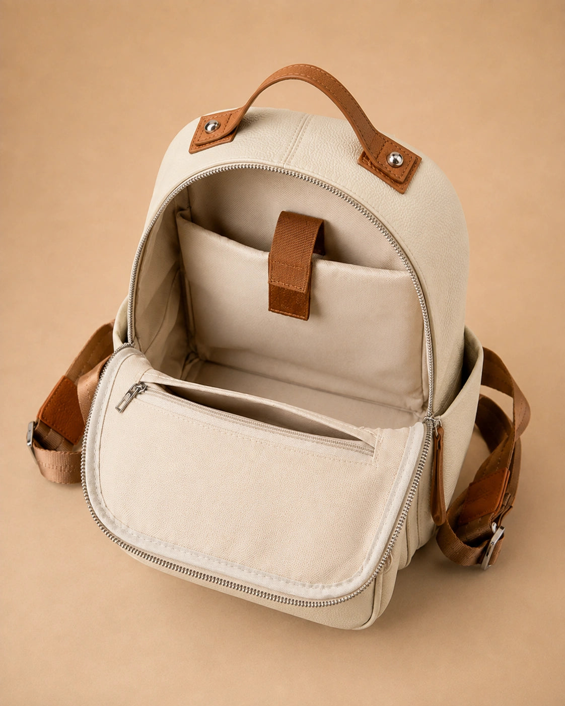 Josephine leather backpack shown from the back with adjustable straps.