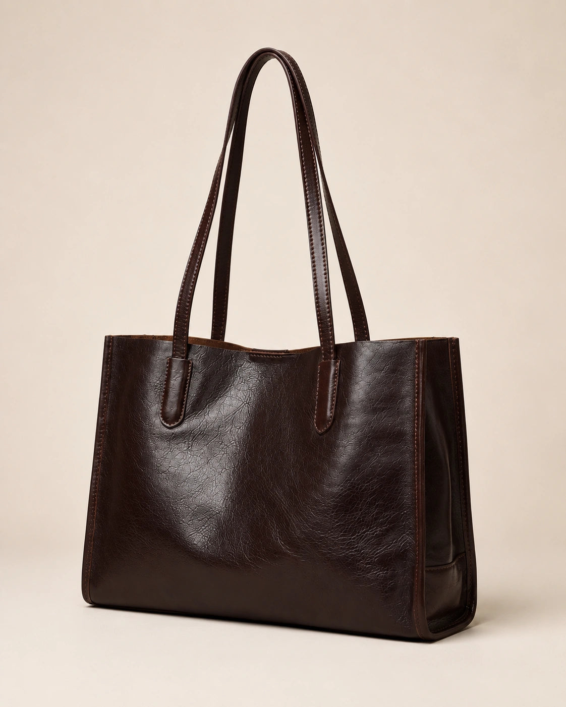 Front view of the Juliette large genuine leather tote bag in dark chocolate