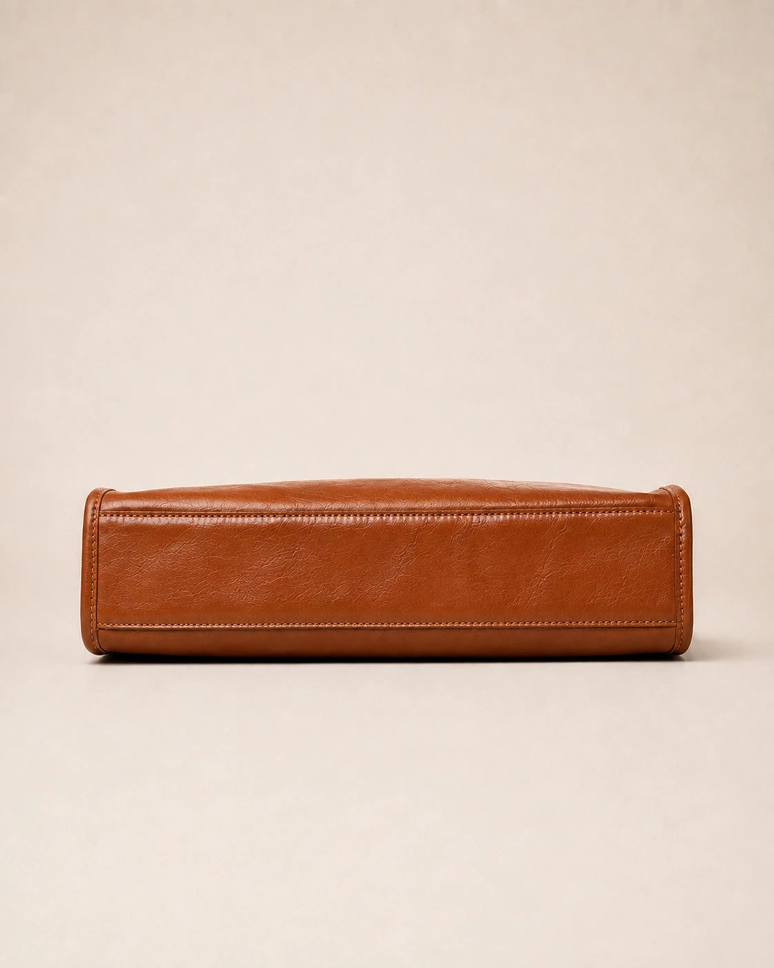 Base view of the Juliette large genuine leather tote bag in tan