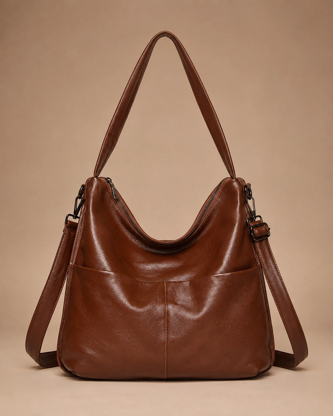 Front view of the Marlowe genuine leather crossbody bag showing the structured vertical silhouette.