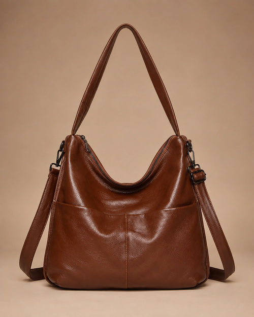 Front view of the Marlowe genuine leather crossbody bag showing the structured vertical silhouette.