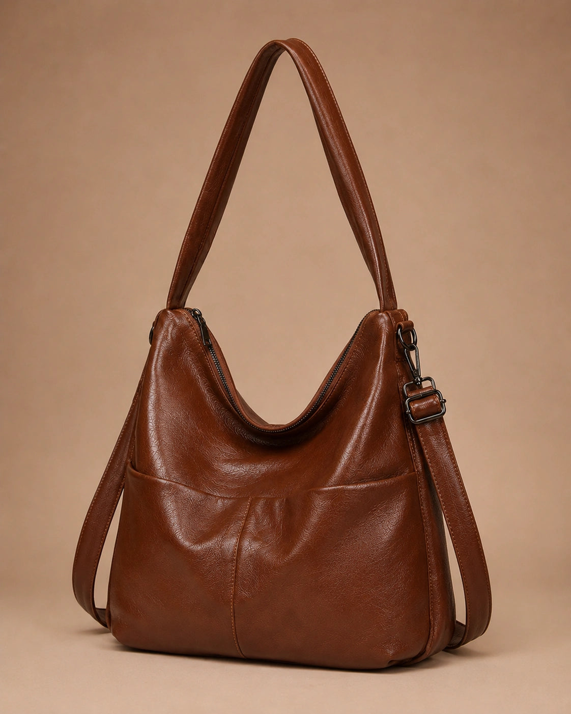The Marlowe genuine leather crossbody bag worn across the body for everyday use.