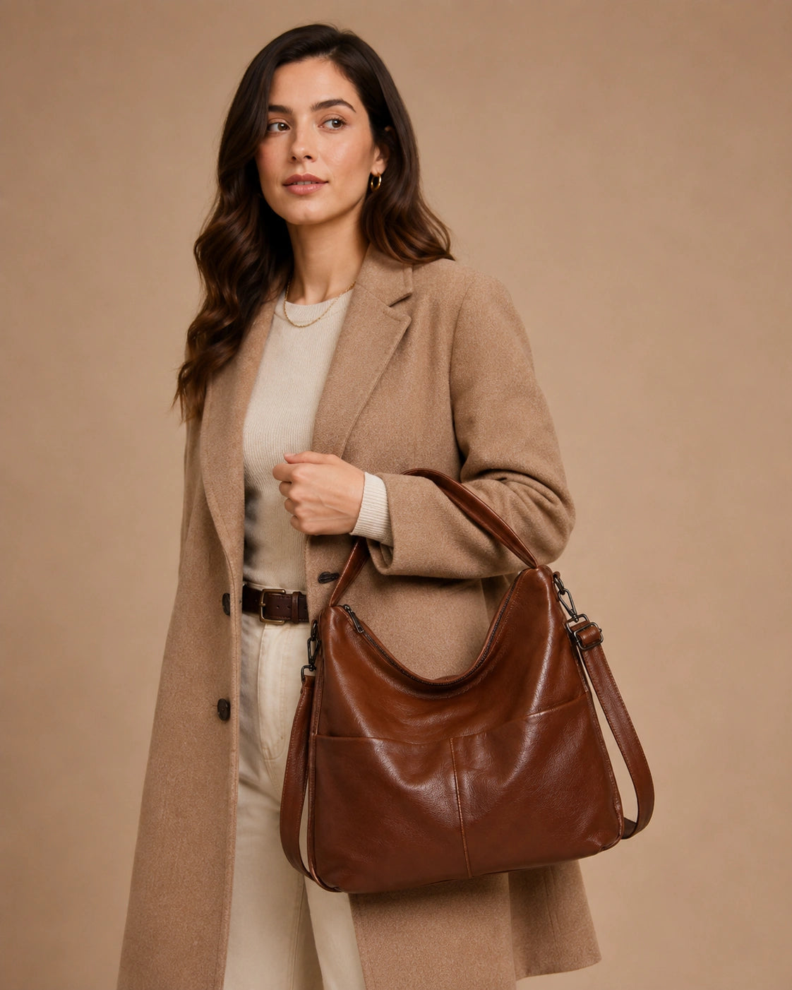 Angled view of the Marlowe genuine leather crossbody bag highlighting the clean stitching detail.