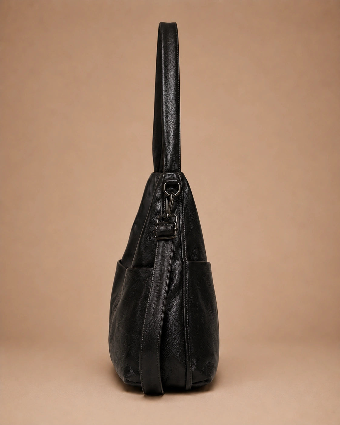 The Marlowe genuine leather crossbody bag shown from a lifestyle angle.