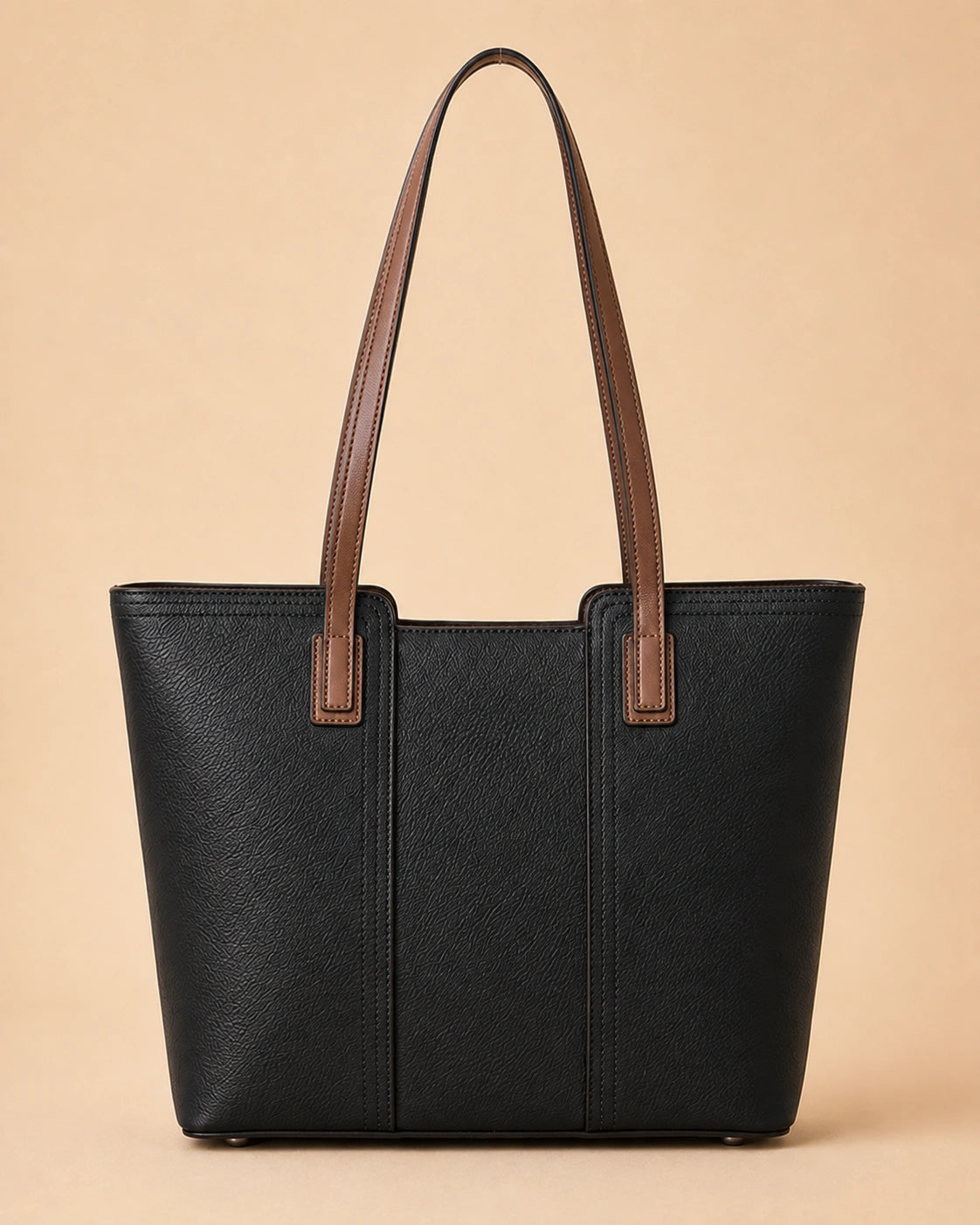 Front view of the Sienna genuine leather tote bag showing the structured silhouette and double shoulder straps.