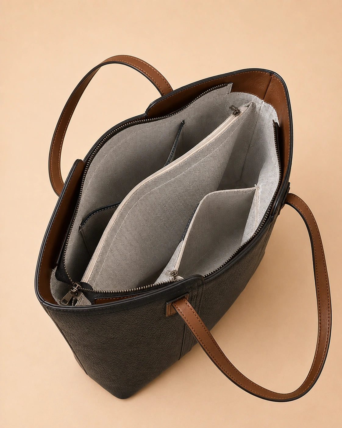 The Sienna genuine leather tote bag worn over the shoulder for everyday use.
