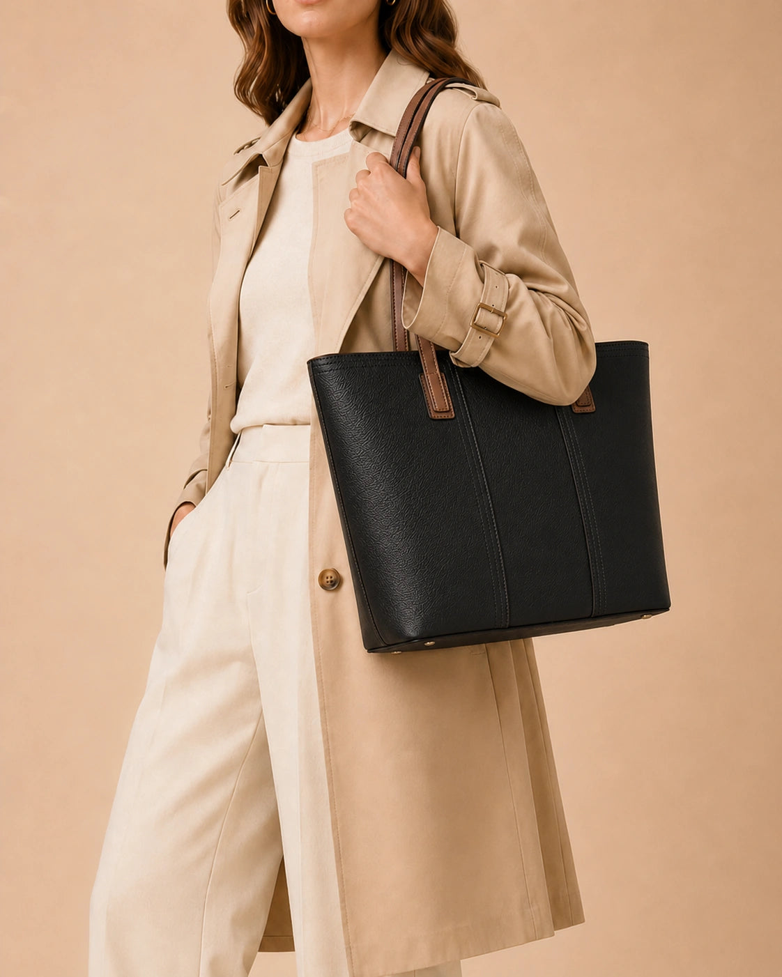 Angled view of the Sienna genuine leather tote bag highlighting the zip closure and clean stitching detail.