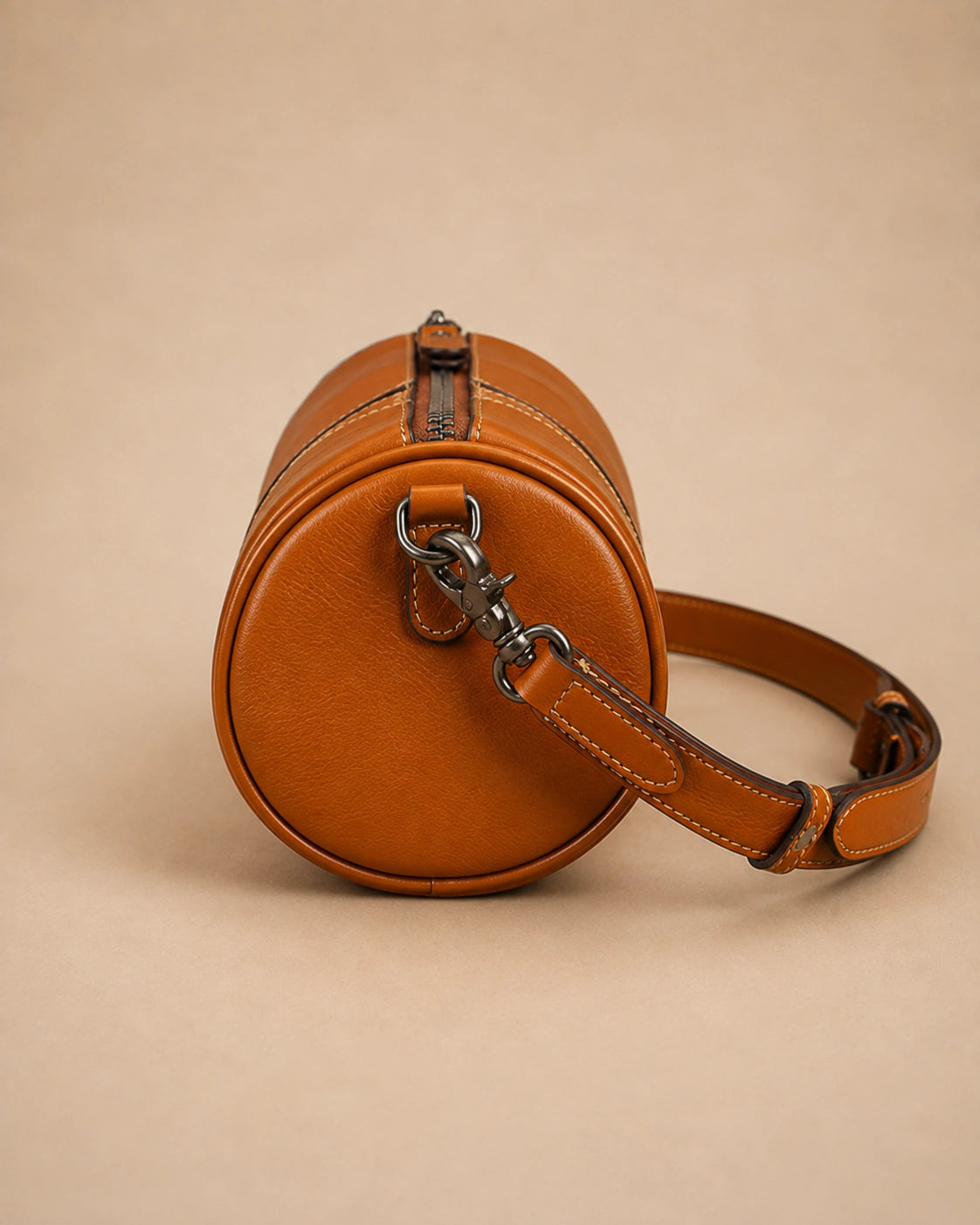 Front view of the Romy genuine leather barrel bag in an alternative colourway.