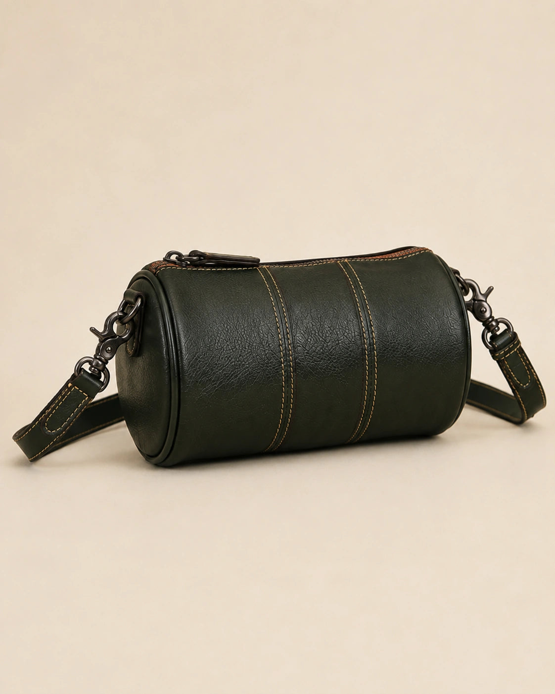 Front view of the Romy genuine leather barrel bag in a further available colourway.