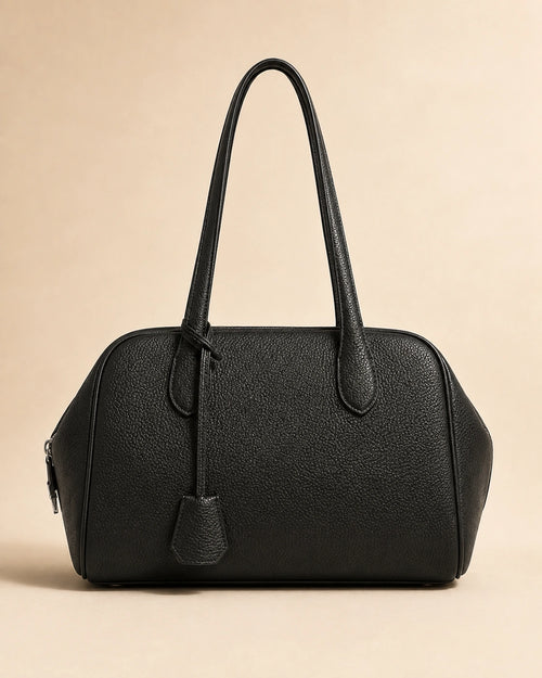Front view of the Wren genuine leather hobo bag showing the relaxed silhouette and double shoulder straps.