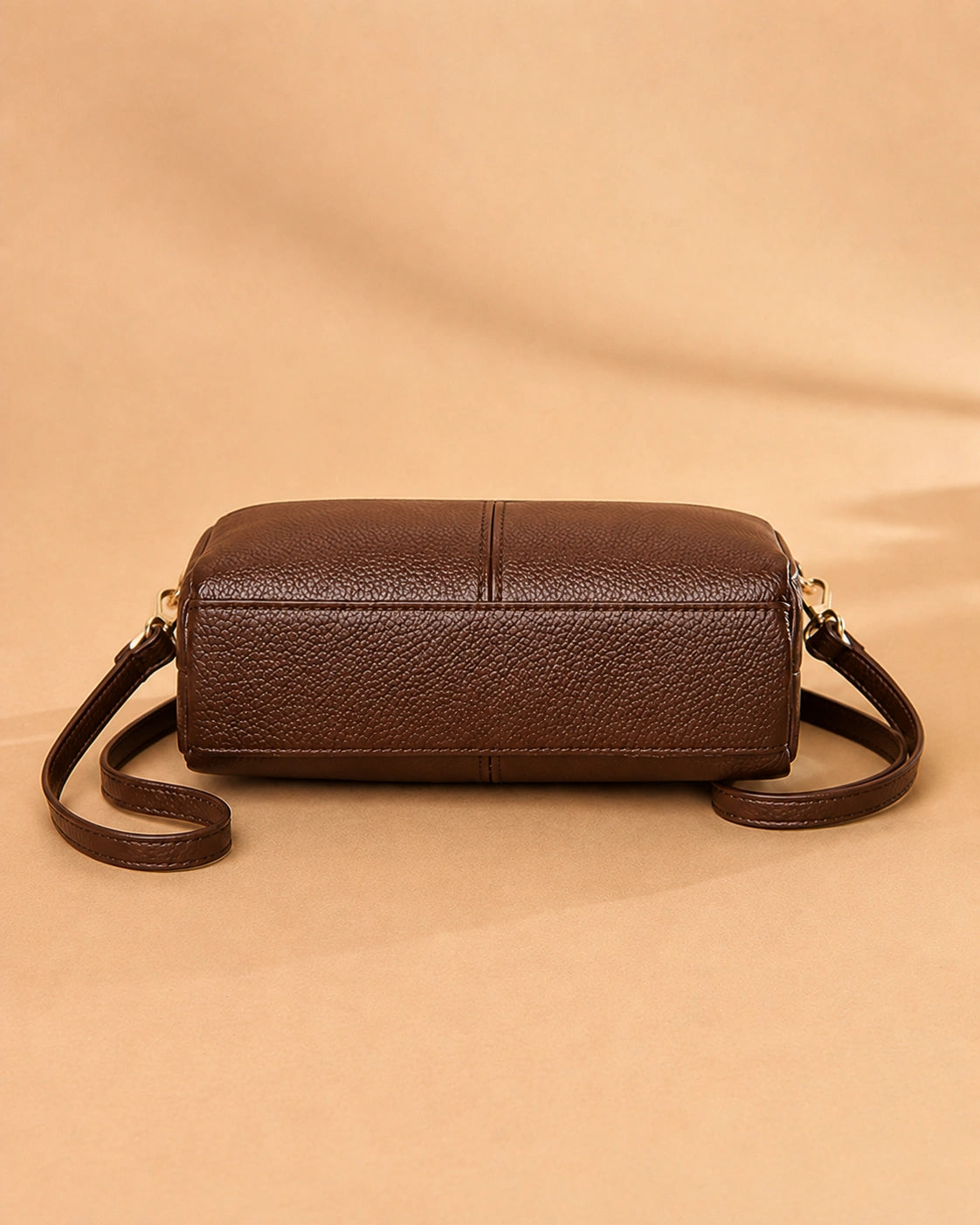 Etta small genuine leather crossbody bag styled with everyday outfits.
