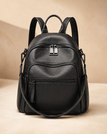 Front view of the Isla lightweight genuine leather travel backpack in black