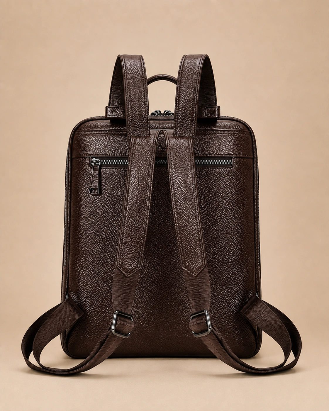 Back view of the Cecily genuine leather backpack with laptop pocket in brown showing the adjustable straps