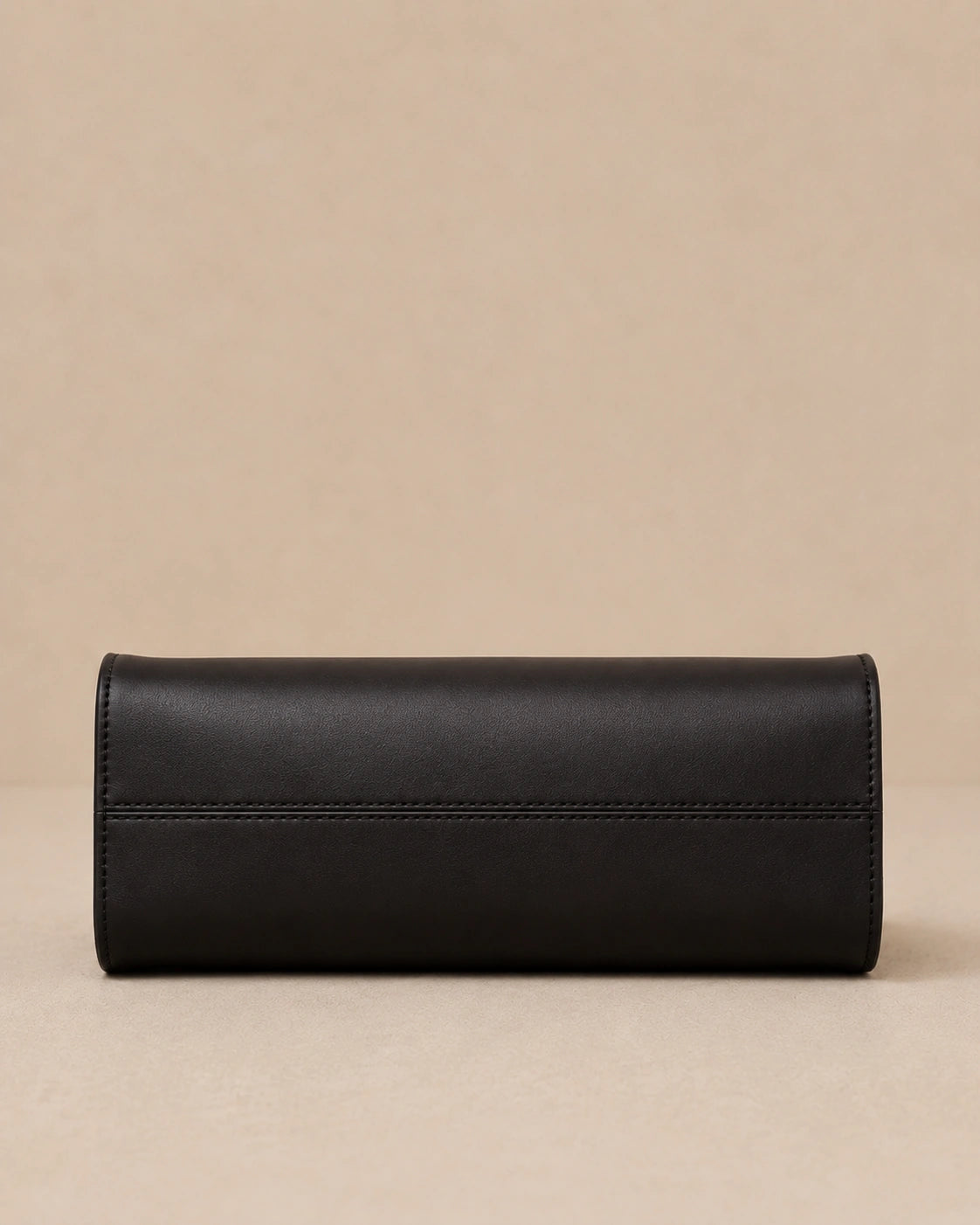 End view of the Corinne genuine leather commuter handbag in black