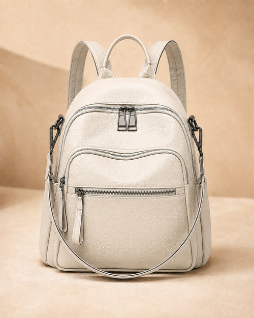 Front view of the Isla lightweight genuine leather travel backpack in off-white