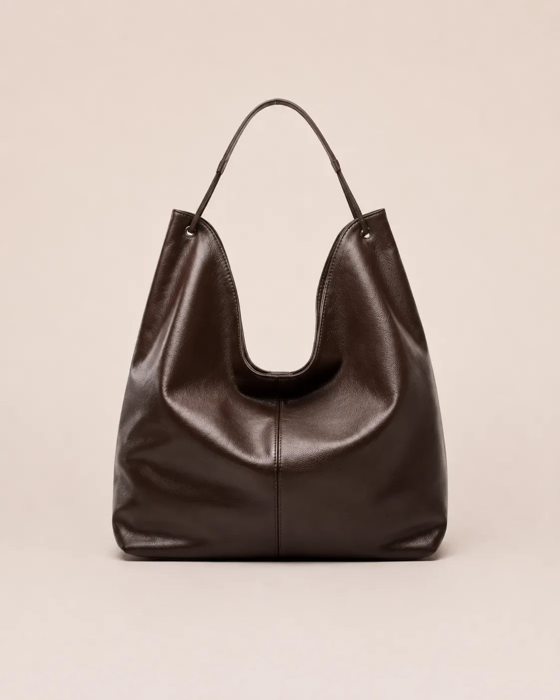 Front view of the Colette dark chocolate leather hobo tote bag crafted from genuine leather with a soft silhouette and spacious everyday design.