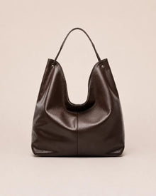 Front view of the Colette dark chocolate leather hobo tote bag crafted from genuine leather with a soft silhouette and spacious everyday design.