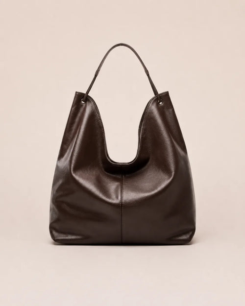 Front view of the Colette dark chocolate leather hobo tote bag crafted from genuine leather with a soft silhouette and spacious everyday design.