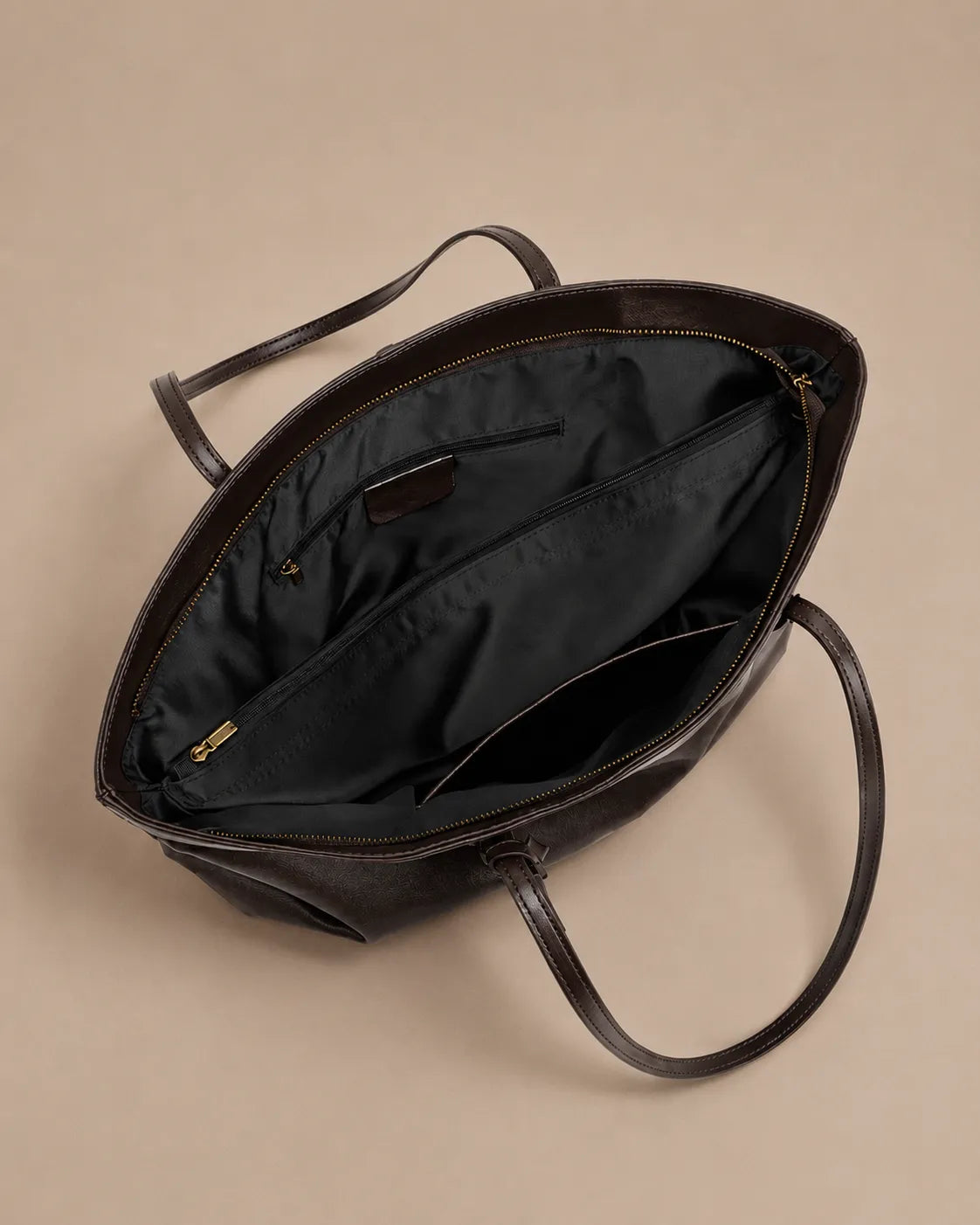 Interior view of the Emilia Tote featuring multiple compartments, zip pocket and spacious organisation for everyday essentials.