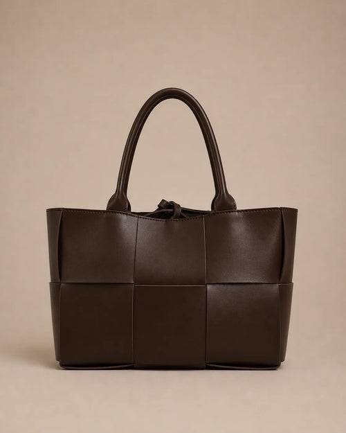 Front view of the Florence woven leather tote bag crafted from genuine chocolate brown leather.