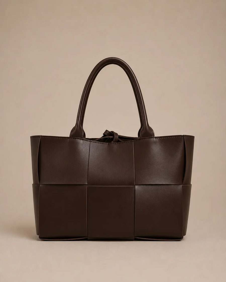 Front view of the Florence woven leather tote bag crafted from genuine chocolate brown leather.