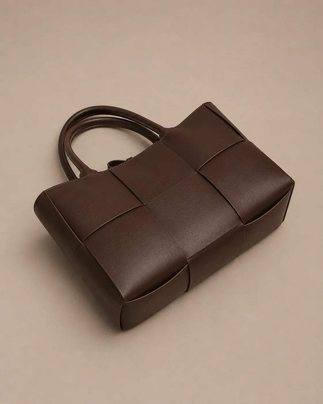 Top view of the Florence woven leather tote bag showcasing its structured silhouette and woven design.