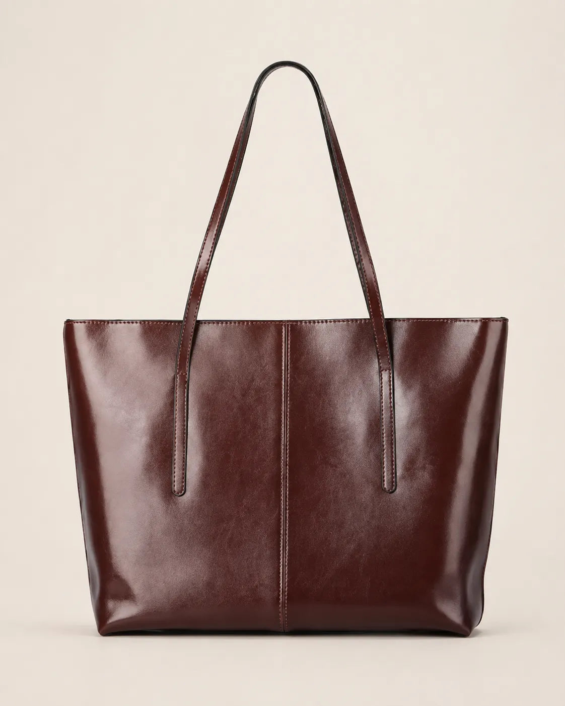 Front profile of the Margaux large dark chocolate leather tote bag crafted from genuine leather with a spacious structured design