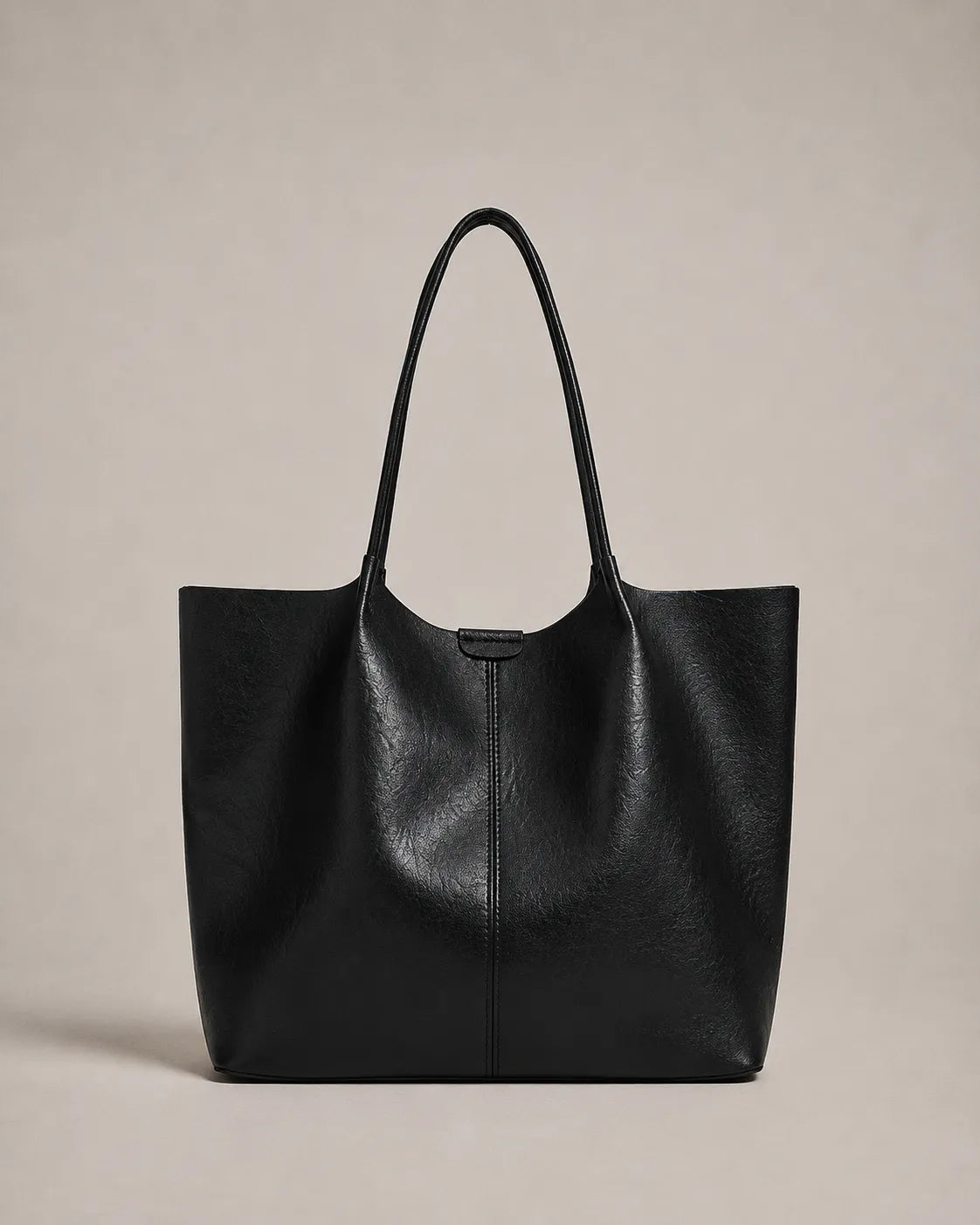Front view of the Valentina Tote in black leather showcasing its refined design, spacious interior and versatile everyday appeal.
