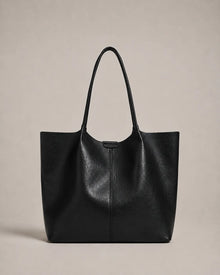 Front view of the Valentina Tote in black leather showcasing its refined design, spacious interior and versatile everyday appeal.