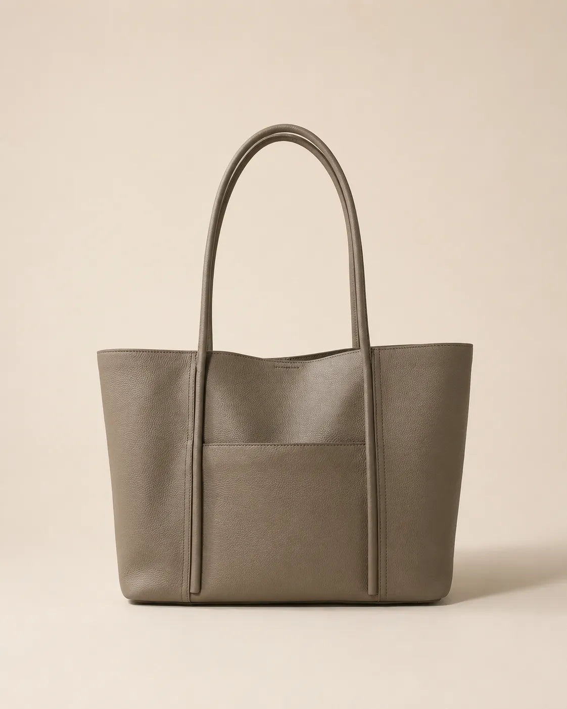 Front view of the Vivienne large Togo leather tote bag in elephant grey with exterior slip pocket and double shoulder straps