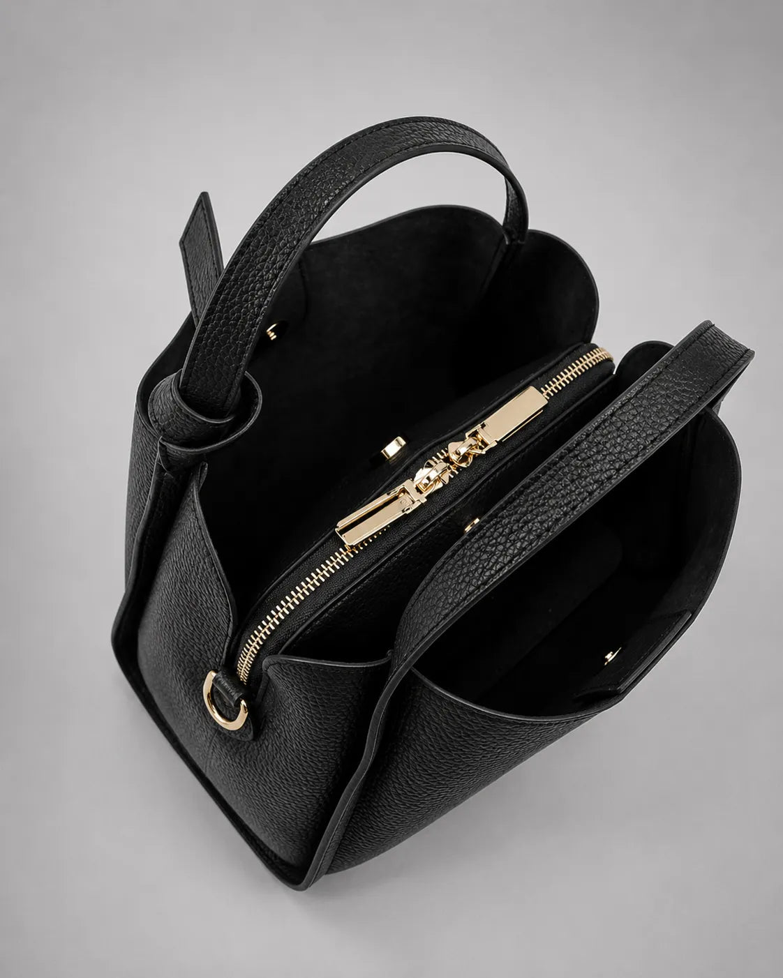Top view of the Amelia Leather Tote Bag in Black genuine leather showcasing multiple compartments and a secure zippered centre section.