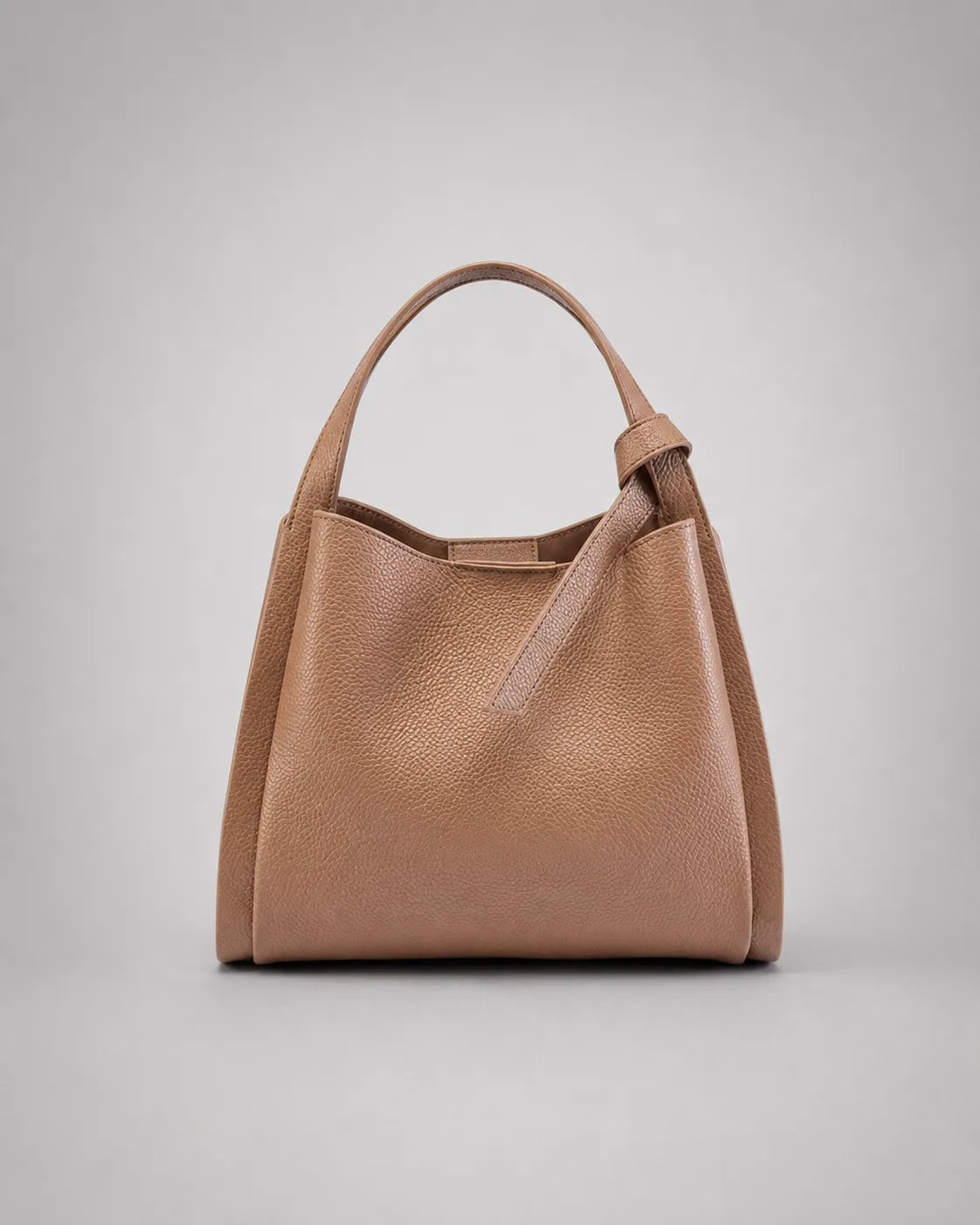 Front view of the Amelia Leather Tote Bag in Khaki genuine leather featuring a timeless minimalist silhouette for everyday elegance.