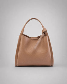 Front view of the Amelia Leather Tote Bag in Khaki genuine leather featuring a timeless minimalist silhouette for everyday elegance.