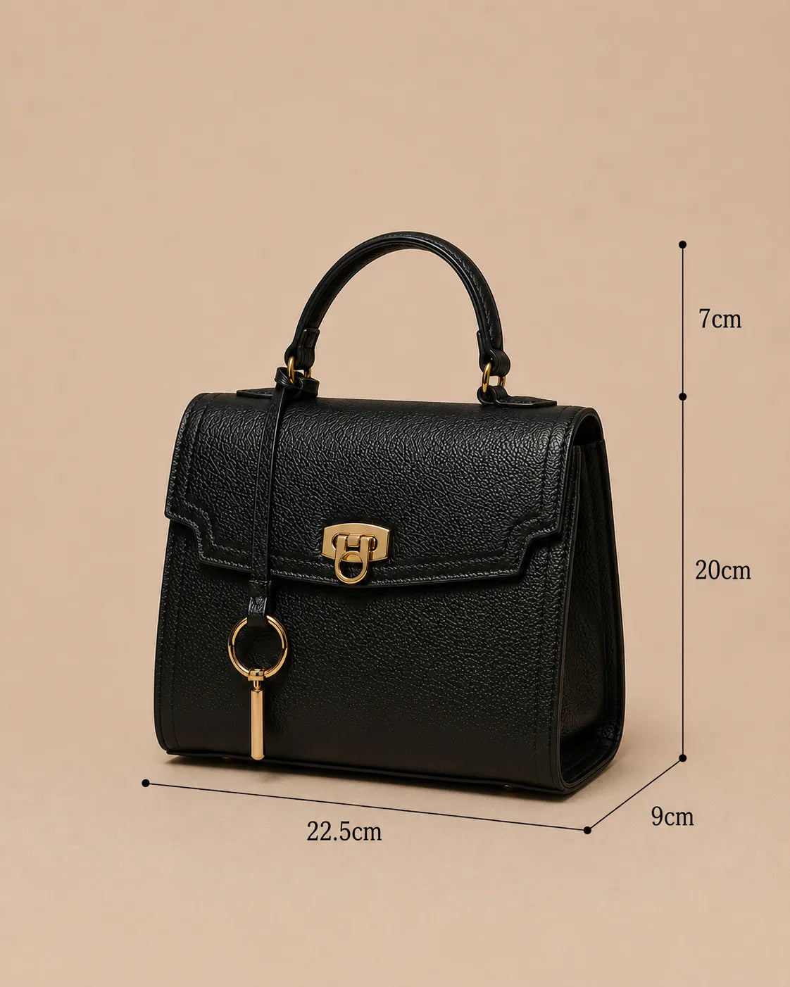 Dimensions guide for the Beatrice genuine leather top handle bag in black. Width 22.5 cm, height 20 cm, depth 9 cm and handle drop 7 cm. Structured leather handbag with gold-tone hardware from The Essentials Collection by Malena London.