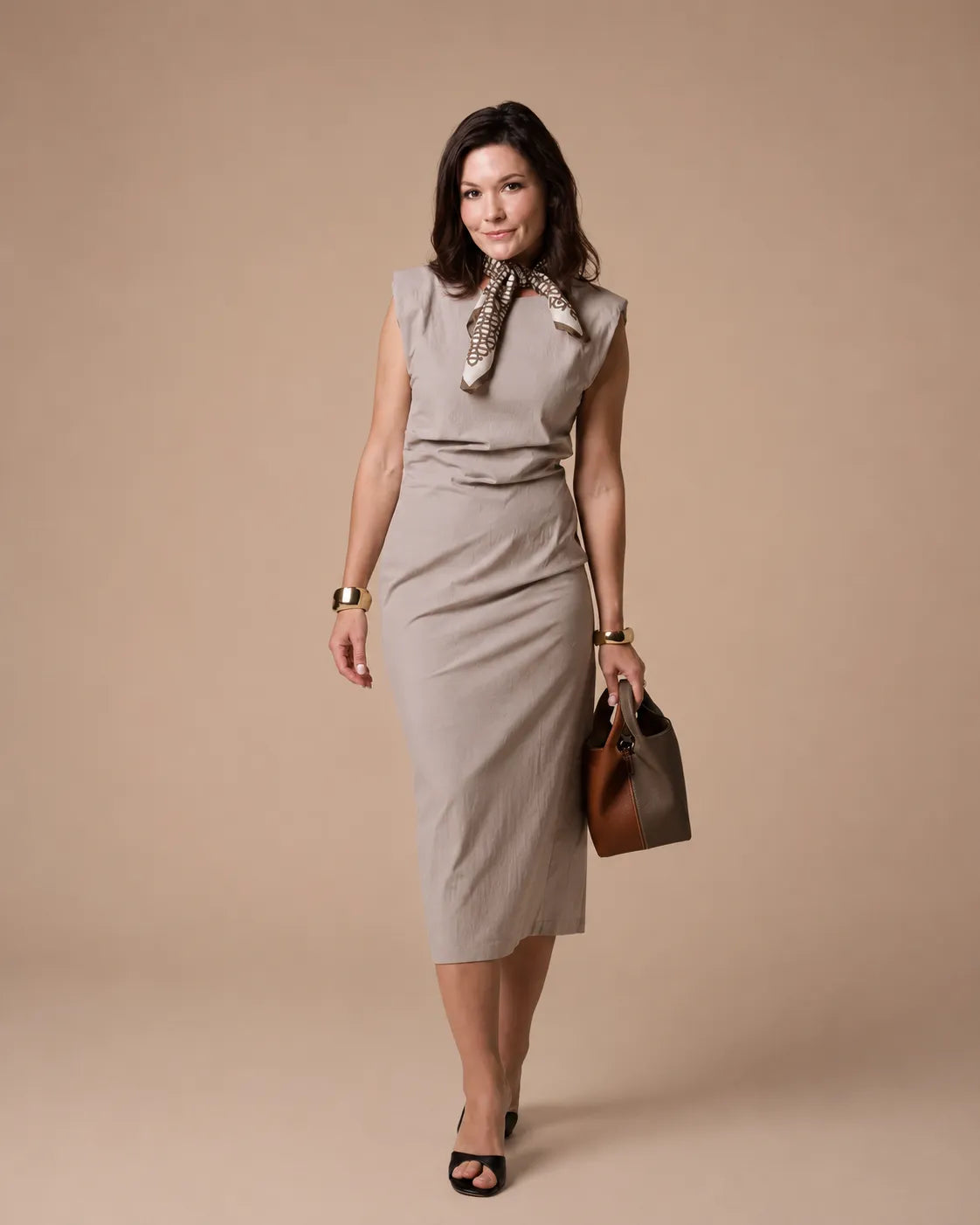 Lifestyle image of the Camille architectural leather bucket bag designed for elevated everyday wear.